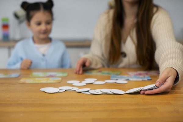 front-view-mother-girl-playing-game